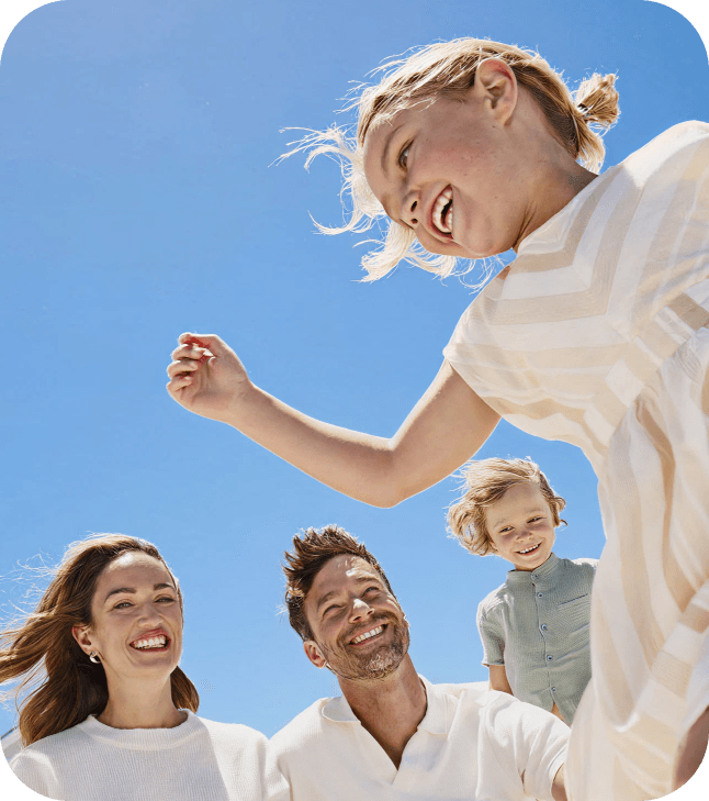Family under blue sky